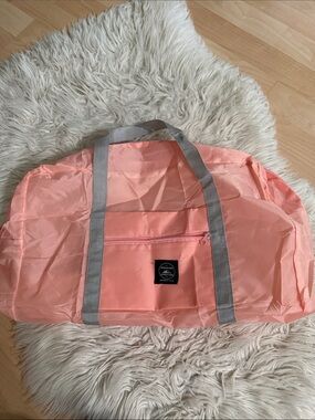 Wind Blows River Flows Foldable Travel Duffel Bag Coral / Peach